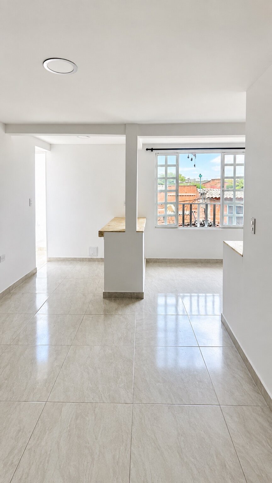 Zona social y cocina del edificio en el barrio Bolivariano